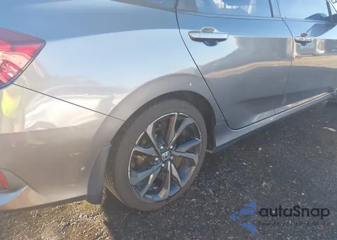 2019 Honda Civic Sport z USA, uszkodzony, nr VIN 19XFC2F89KE009722